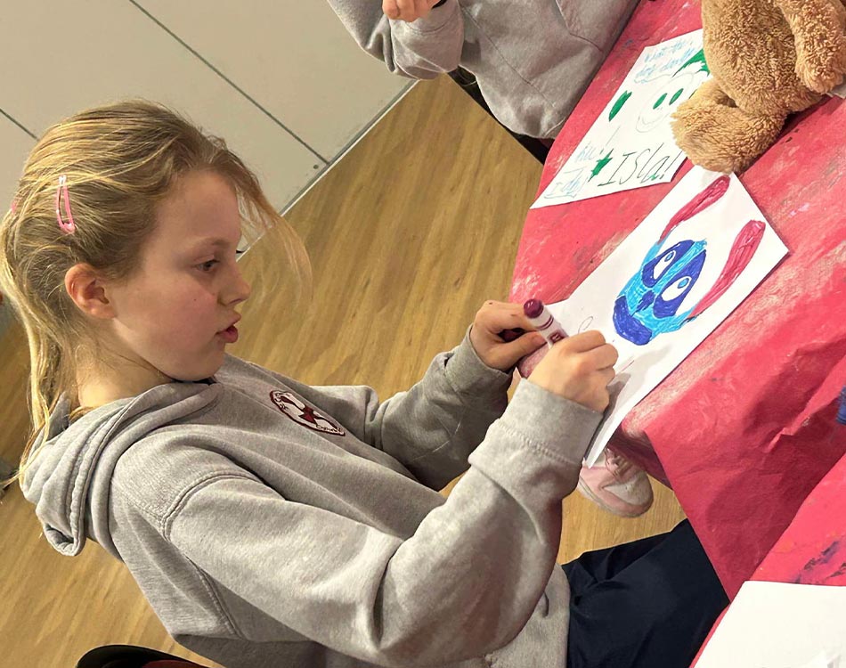 Young artists taking part in a Creative Youth Opportunities art class