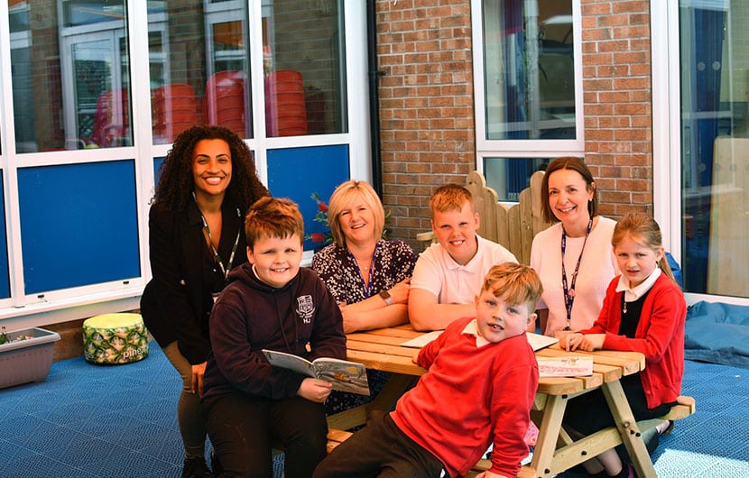 Some of the Whitley & Eggborough Community Primary School children in their new outdoor library with (back, from left) Jamilah Hassan of the Banks Group, school business manager Diane Steward and headteacher Alison Coventry