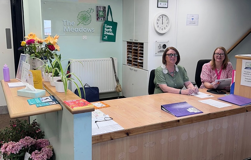Chief Officer Karyn Ainsley and Receptionist Theresa Ellis in the Meadow Well Connected Community Centre's current reception area